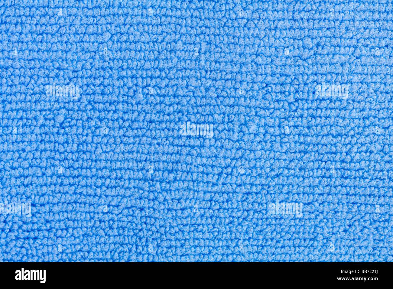 serviette en microfibre bleu ciel gros plan, poil structuré moelleux, chiffon de séchage Banque D'Images