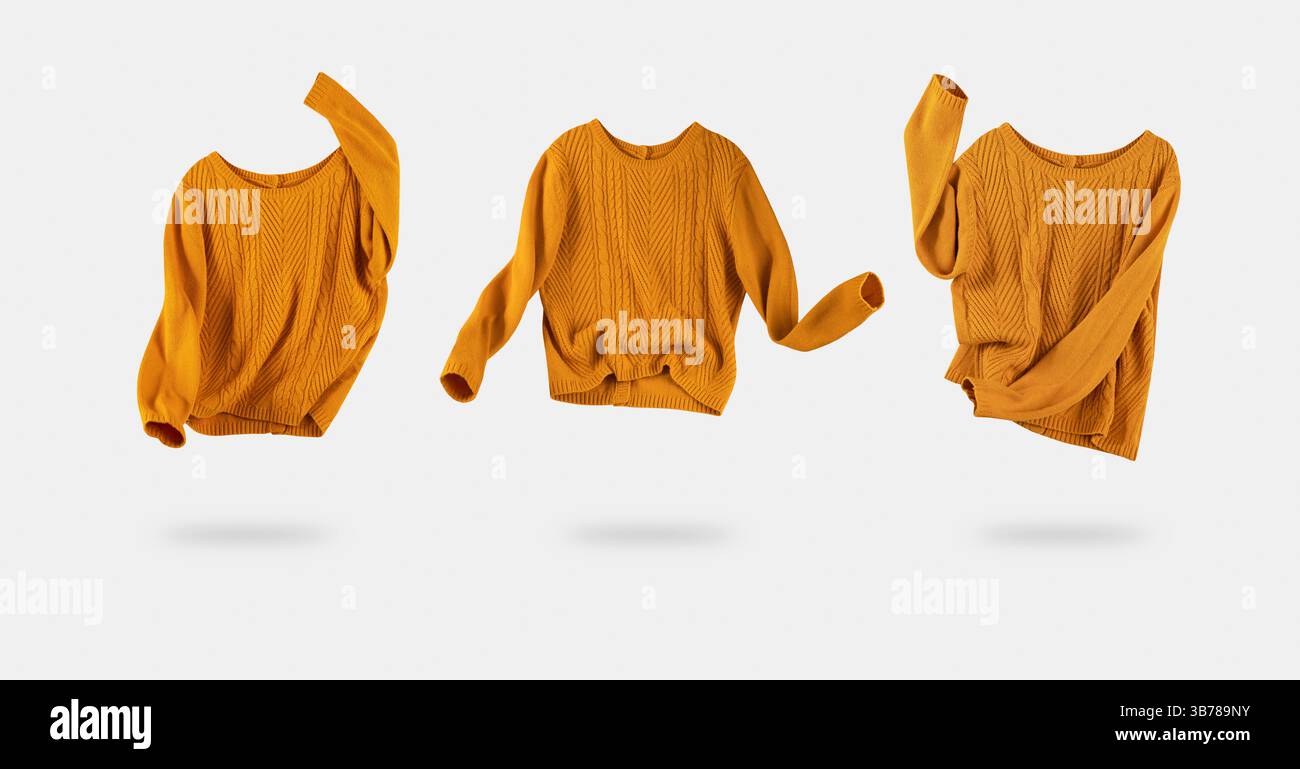 Ensemble de chandails volants jaune orange isolé. Vêtements tendance pour femmes. Tricot. Pull tricoté en laine. Vêtements féminins de mode lumineux. Banque D'Images