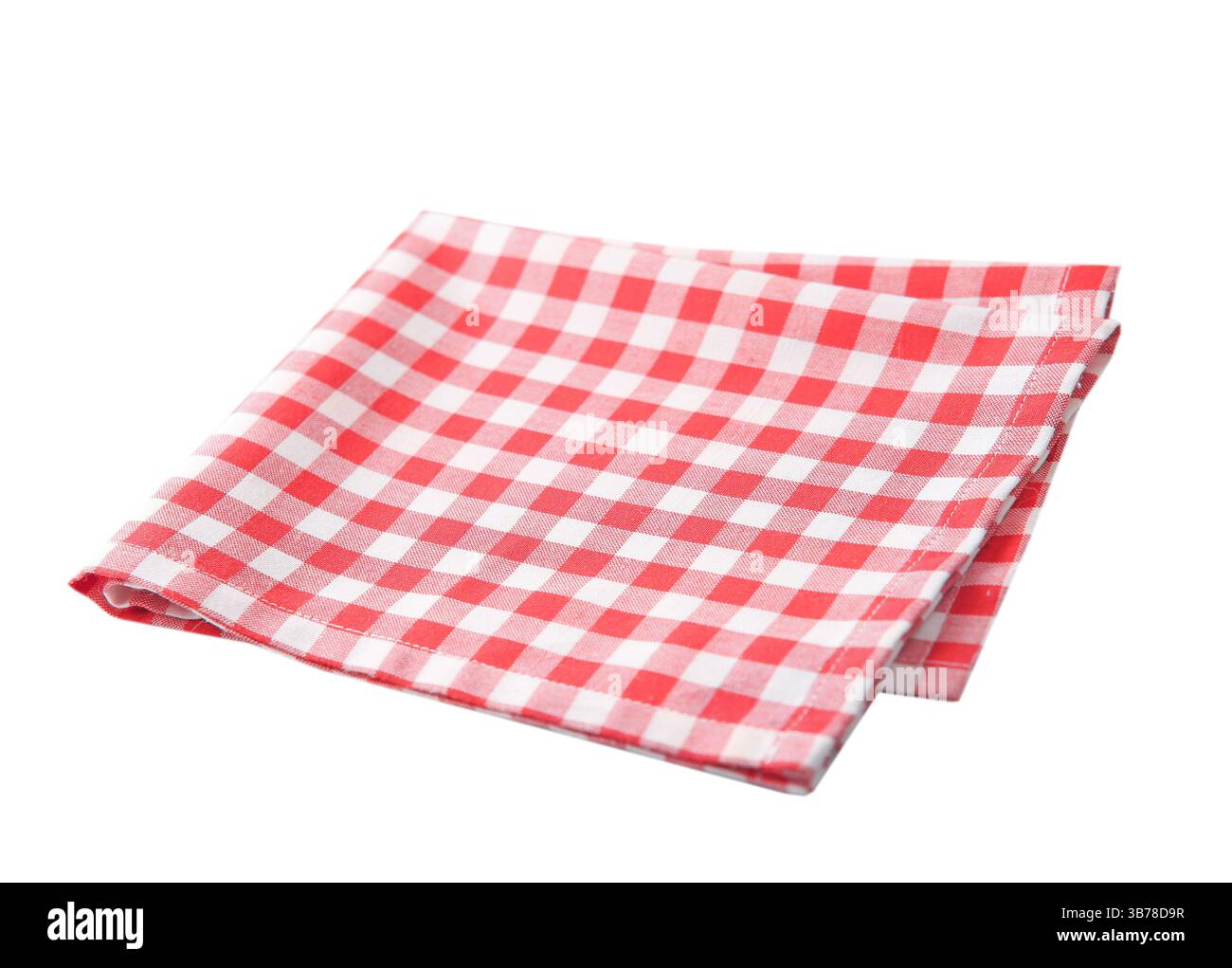 Tissu de pique-nique rouge isolé, serviette à carreaux pliée de cuisine. Banque D'Images