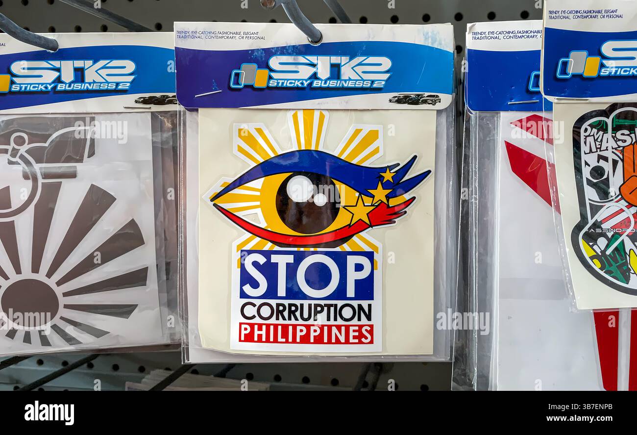 Manille : autocollant ARRÊTER LA CORRUPTION PHILIPPINES à vendre. Un moyen pour les Philippins de protester dans un pays sujet à la violence électorale et aux meurtres électoraux - Image de stock capturée avec un smartphone