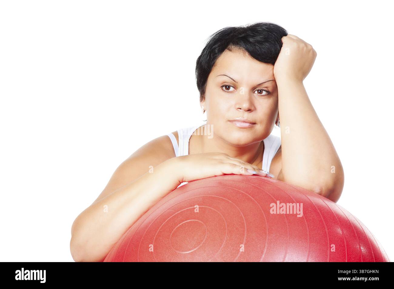 Grosse femme avec une grosse boule rouge Banque D'Images