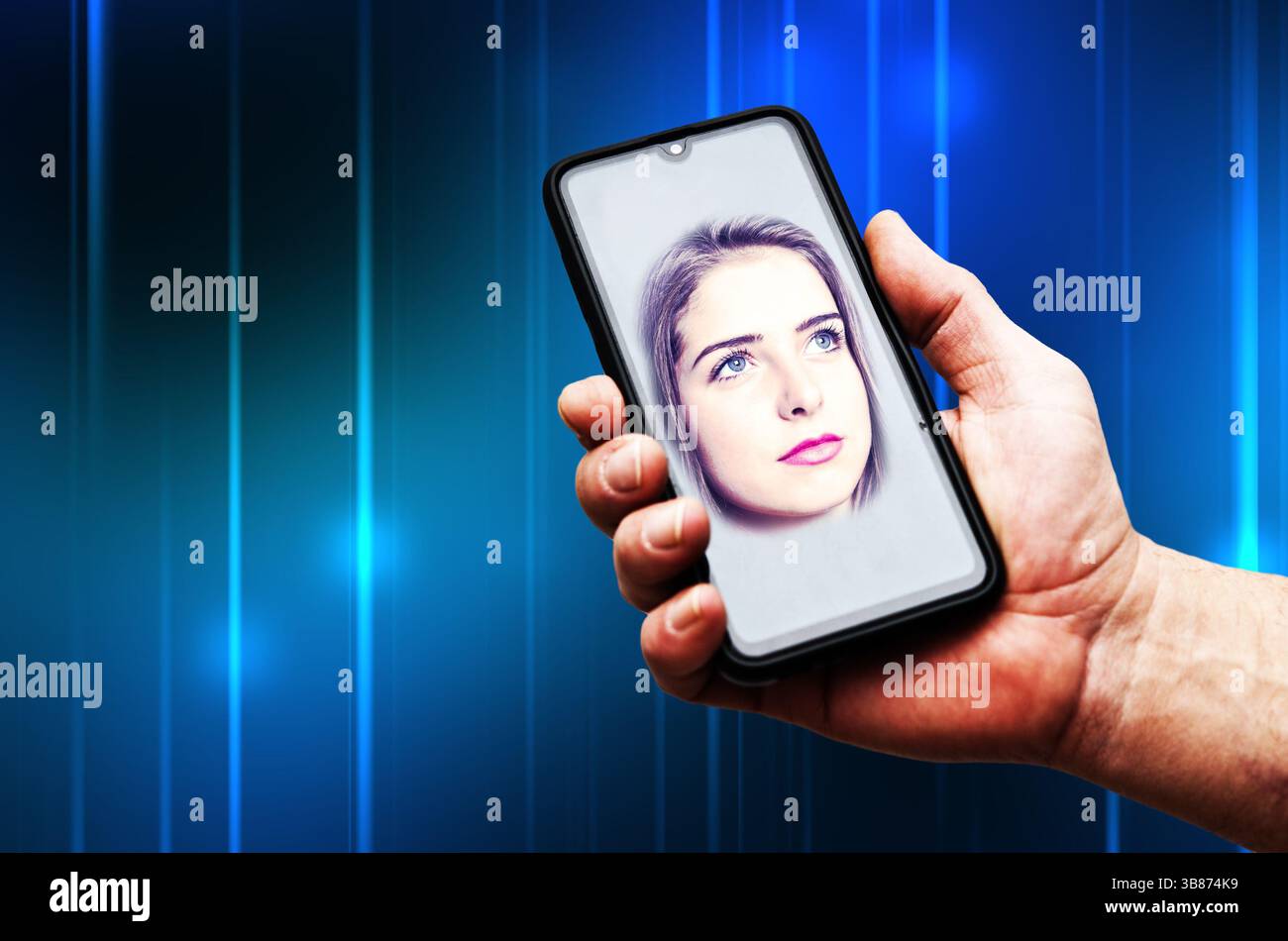 main tenant un smartphone avec un assistant numérique Banque D'Images