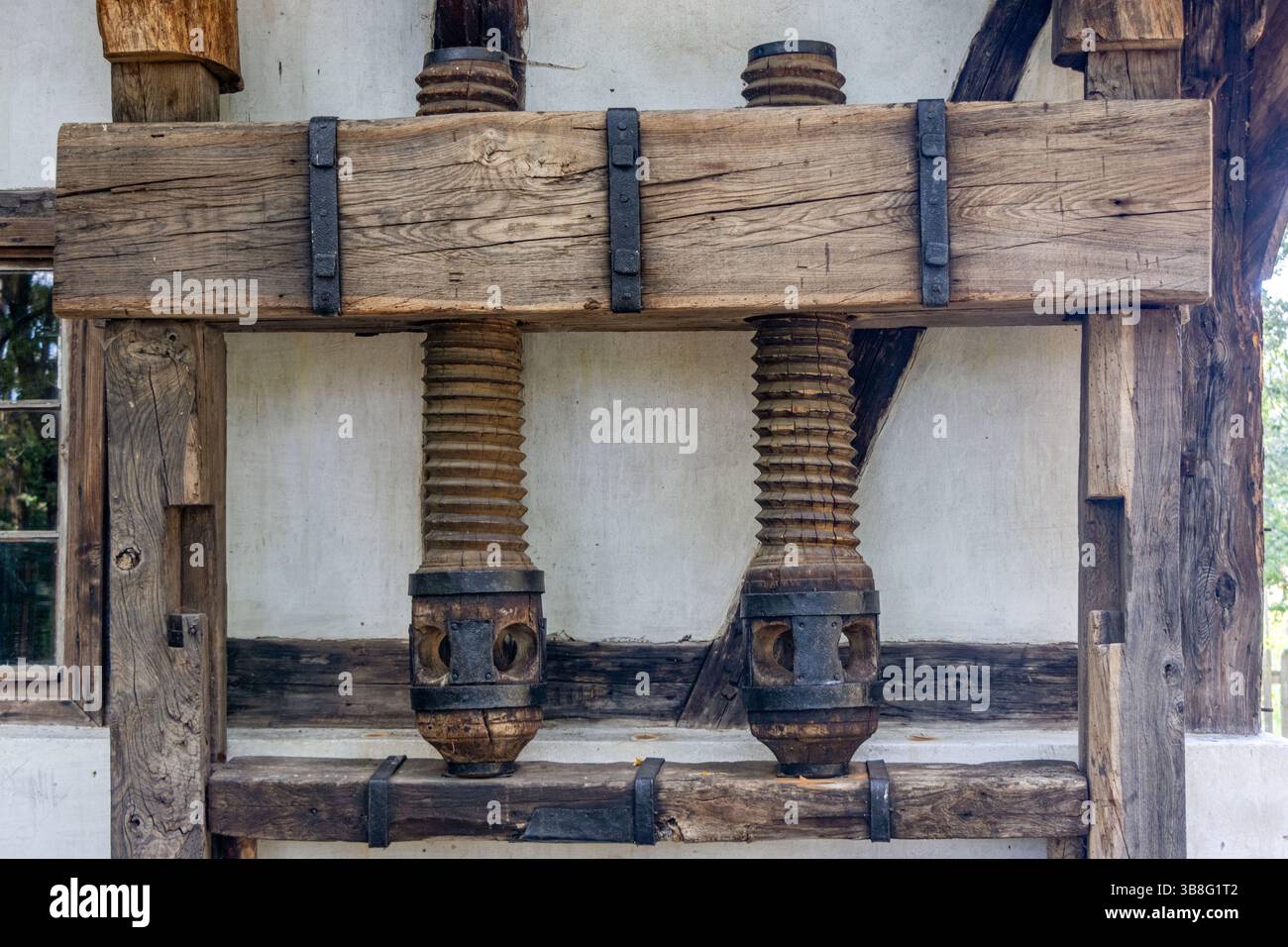 Un ancien presse à vis à raisin, gros plan Banque D'Images