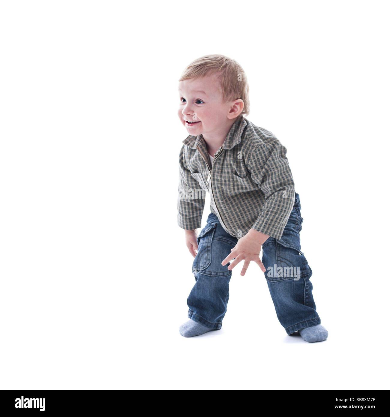 Mignon joueur un an tout-petit isolé sur fond blanc Banque D'Images