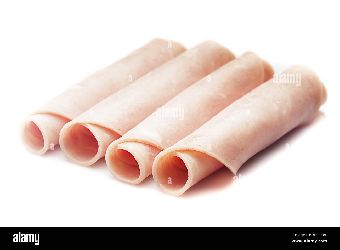 Roulés Feuilletés au jambon frais isolated on white Banque D'Images Roulés Feuilletés au jambon frais isolated on white Banque D'Images