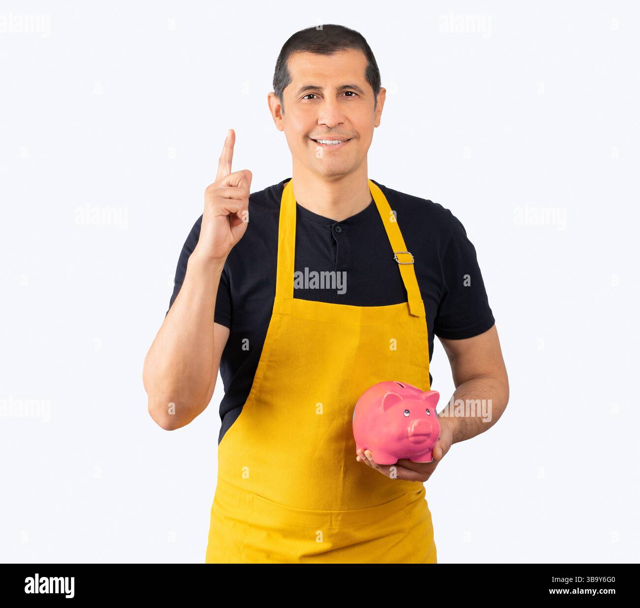 Bel homme portant un tablier d'employé sur fond isolé Banque D'Images