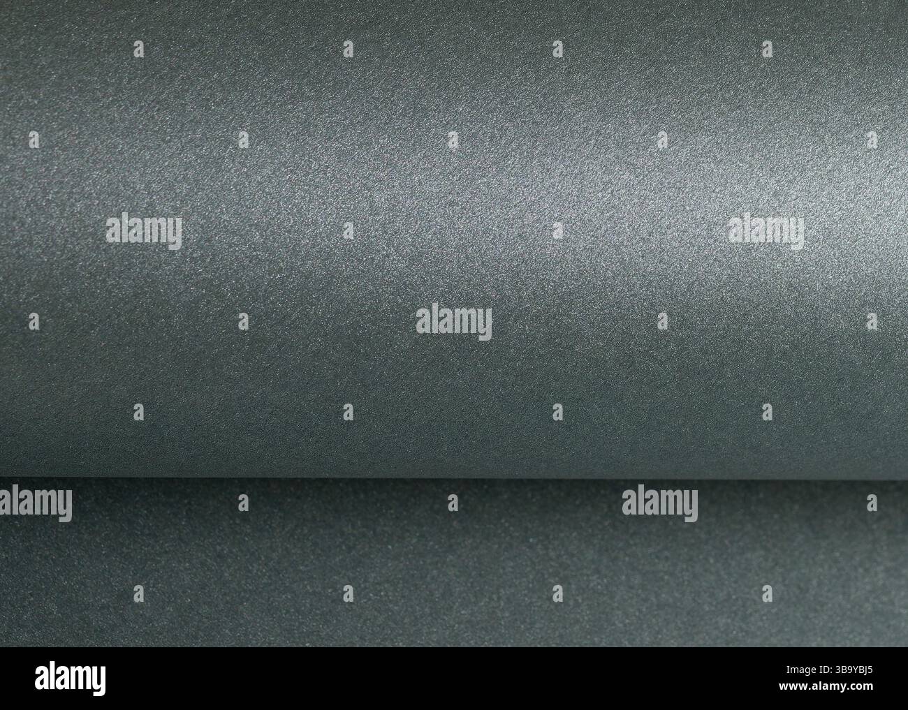 Texture du papier avec ton vert métallique, composition roulée et stratifiée, surface brillante avec des reflets et des paillettes, vert forêt élégant et vert sauge c Banque D'Images