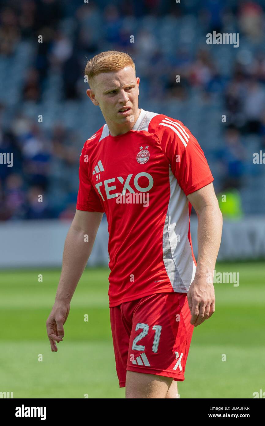 GAVIN MILLOY, footballeur professionnel, joue actuellement pour l'Aberdeen FC. Image prise lors d'une séance d'échauffement et d'entraînement avant match. Banque D'Images