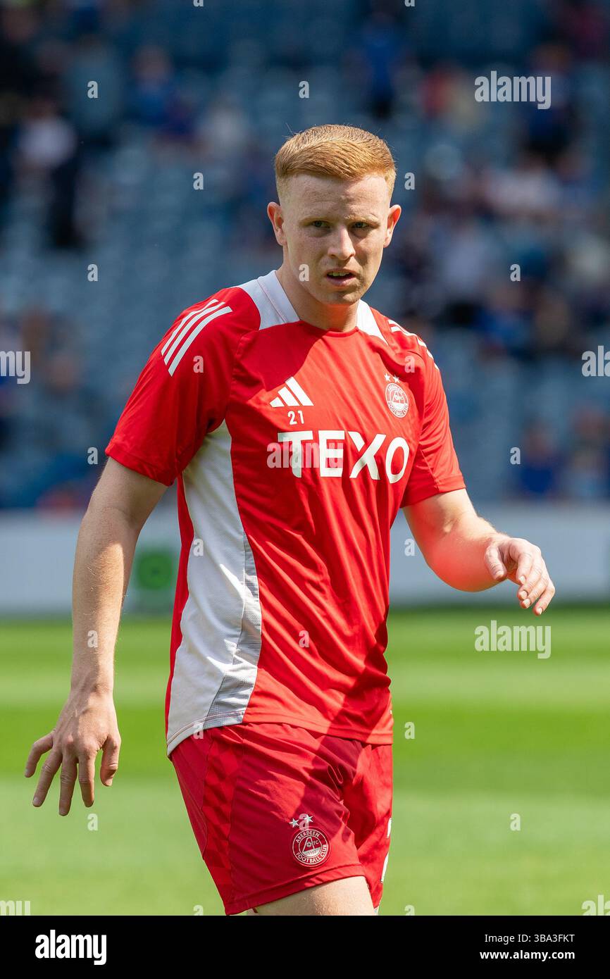 GAVIN MILLOY, footballeur professionnel, joue actuellement pour l'Aberdeen FC. Image prise lors d'une séance d'échauffement et d'entraînement avant match. Banque D'Images