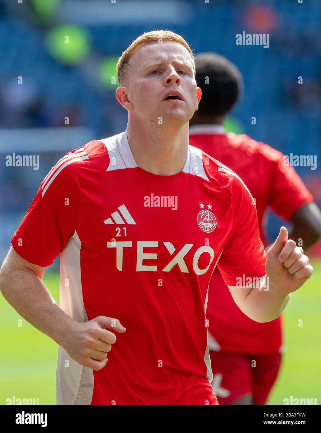 GAVIN MILLOY, footballeur professionnel, joue actuellement pour l'Aberdeen FC. Image prise lors d'une séance d'échauffement et d'entraînement avant match. Banque D'Images