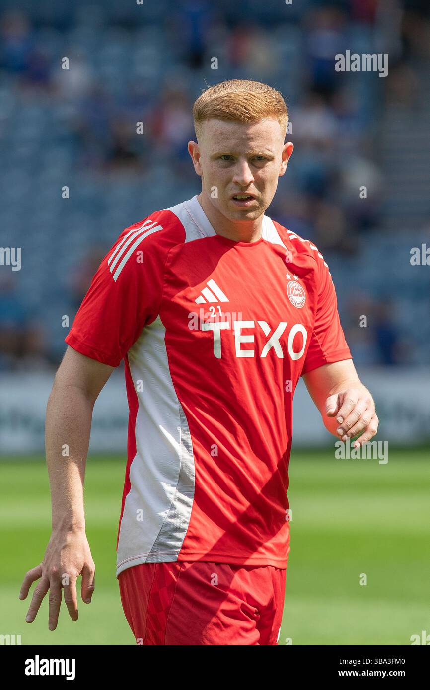 GAVIN MILLOY, footballeur professionnel, joue actuellement pour l'Aberdeen FC. Image prise lors d'une séance d'échauffement et d'entraînement avant match. Banque D'Images