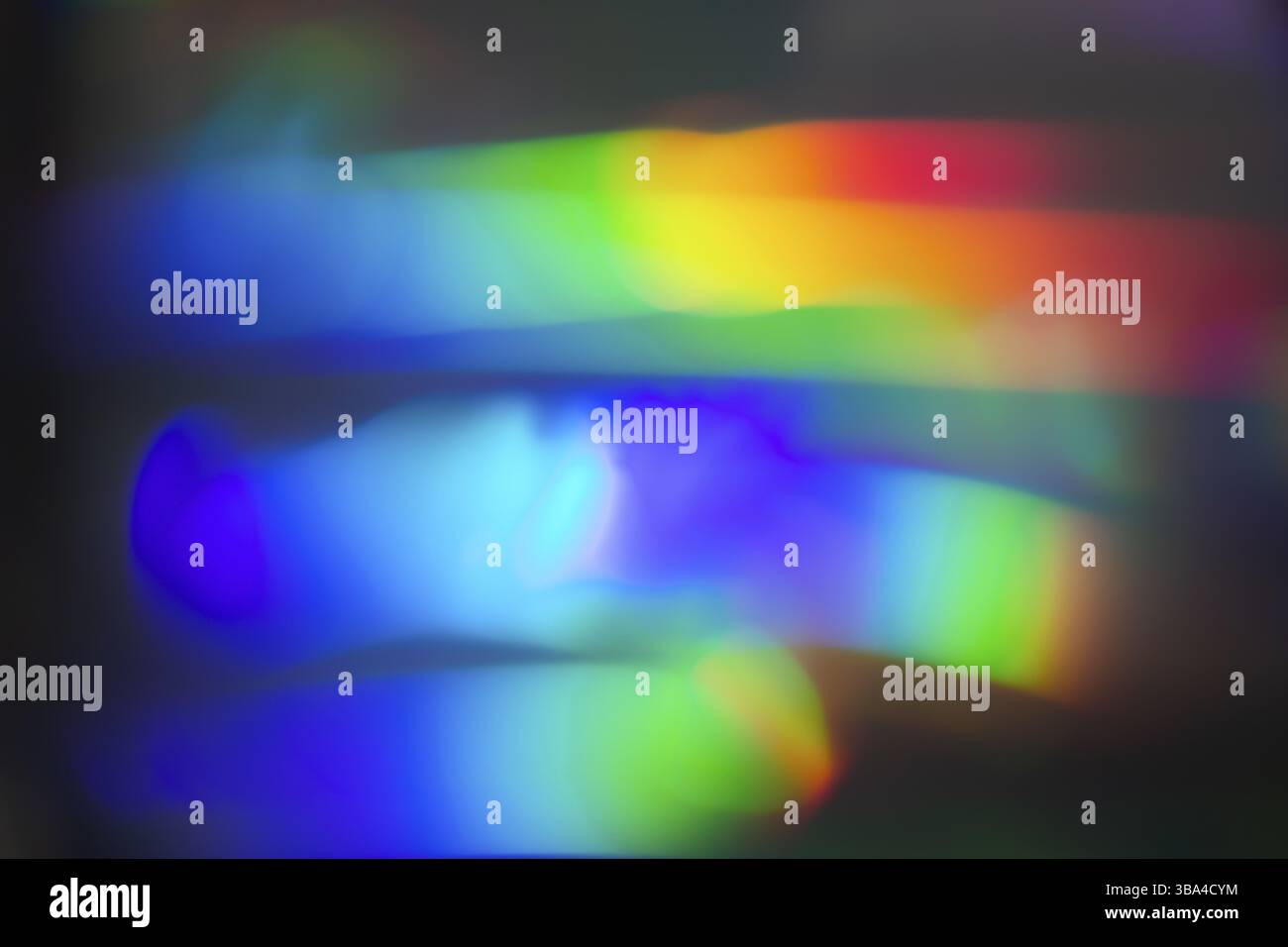 Fond bokeh holographique arc-en-ciel. Débordements multicolores de couleur Banque D'Images
