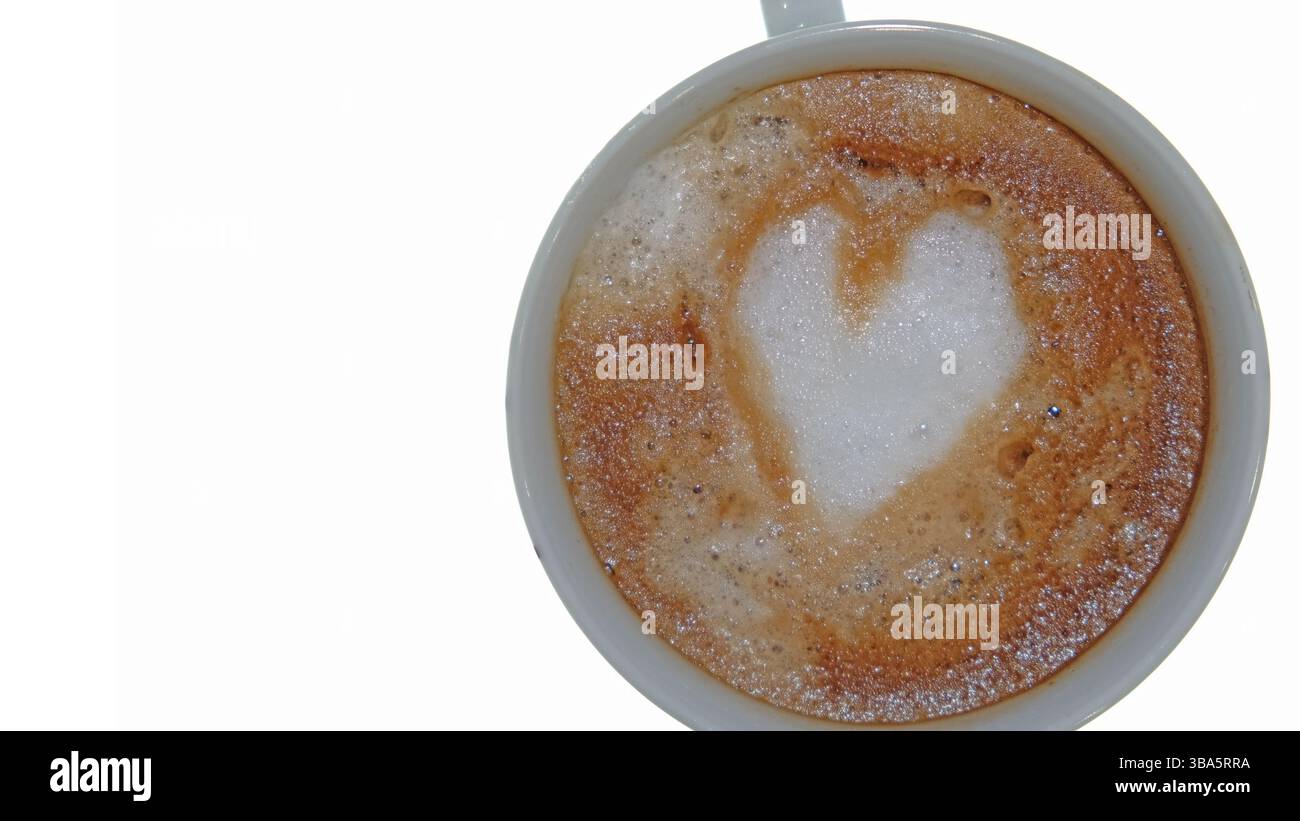 Tirelire rose avec des pièces de choco sur fond noir Banque D'Images