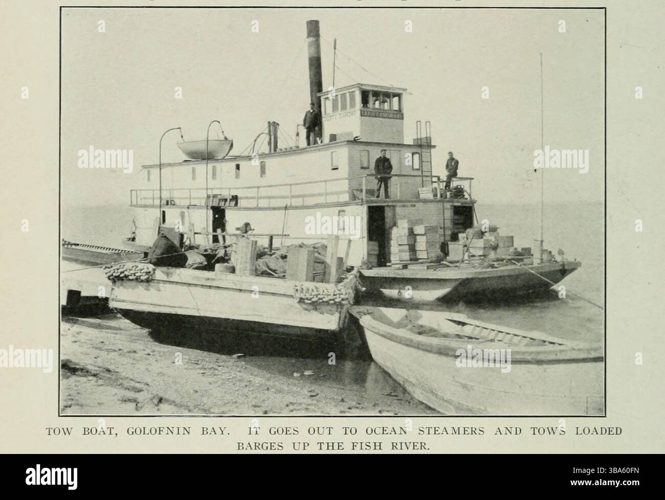 REMORQUEUR, GOLOFNIN BAY. IL VA JUSQU'AUX BATEAUX À VAPEUR DE L'OCÉAN ET REMORQUE DES BARGES CHARGÉES JUSQU'À LA RIVIÈRE FISH. De l'article L'OUVERTURE DU TERRITOIRE DE L'ALASKA. Par Harrington Emerson. Photographies de E. A. Hegg et Kinne, tirées de The Engineering Magazine consacré au progrès industriel volume XXIV octobre 1902 - mars 1903 The Engineering Magazine Co Banque D'Images