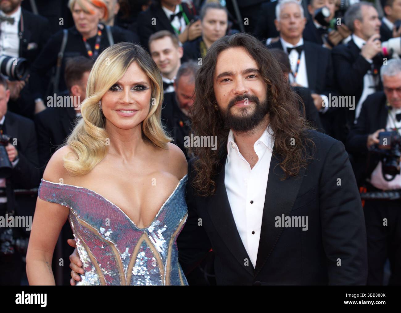 La mannequin allemande Heidi Klum et son mari Tom Kaulitz sur le tapis rouge du Festival de Cannes 2025 pour la première de Mission impossible. Banque D'Images