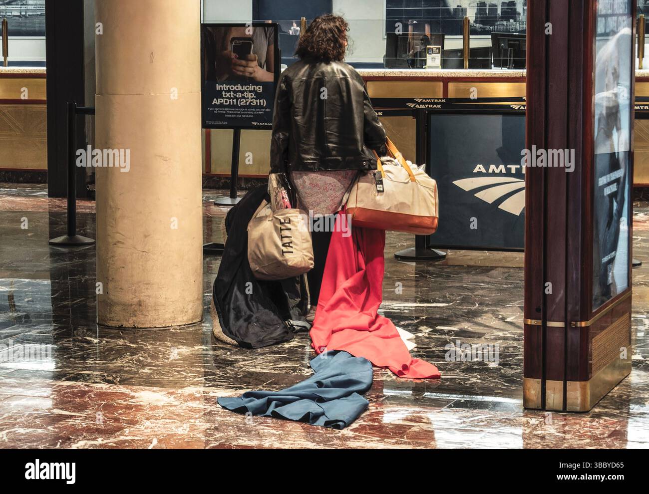 Passager dans une gare Banque D'Images