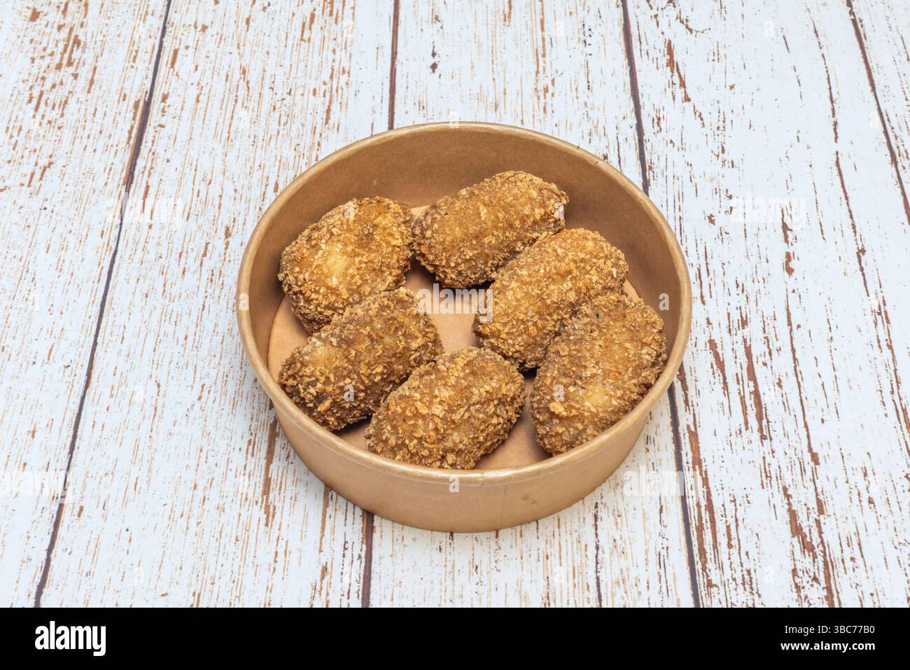 Au-delà de sa saveur et de sa texture, la croquette a des racines culturelles profondes Banque D'Images Au-delà de sa saveur et de sa texture, la croquette a des racines culturelles profondes Banque D'Images