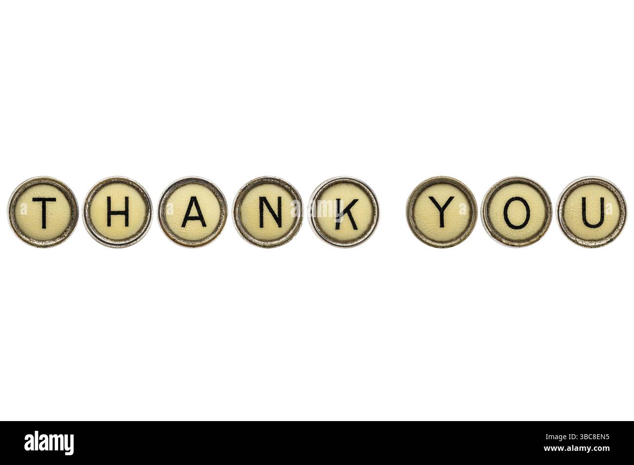 Texte de remerciement dans de vieilles clés rondes de machine à écrire isolées sur blanc Banque D'Images