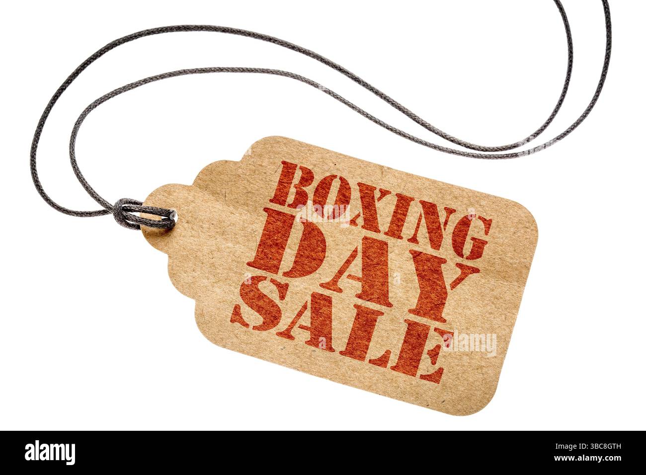 Affiche de solde du lendemain de Noël – étiquette de prix en papier avec ficelle isolée sur le concept de magasinage blanc Banque D'Images