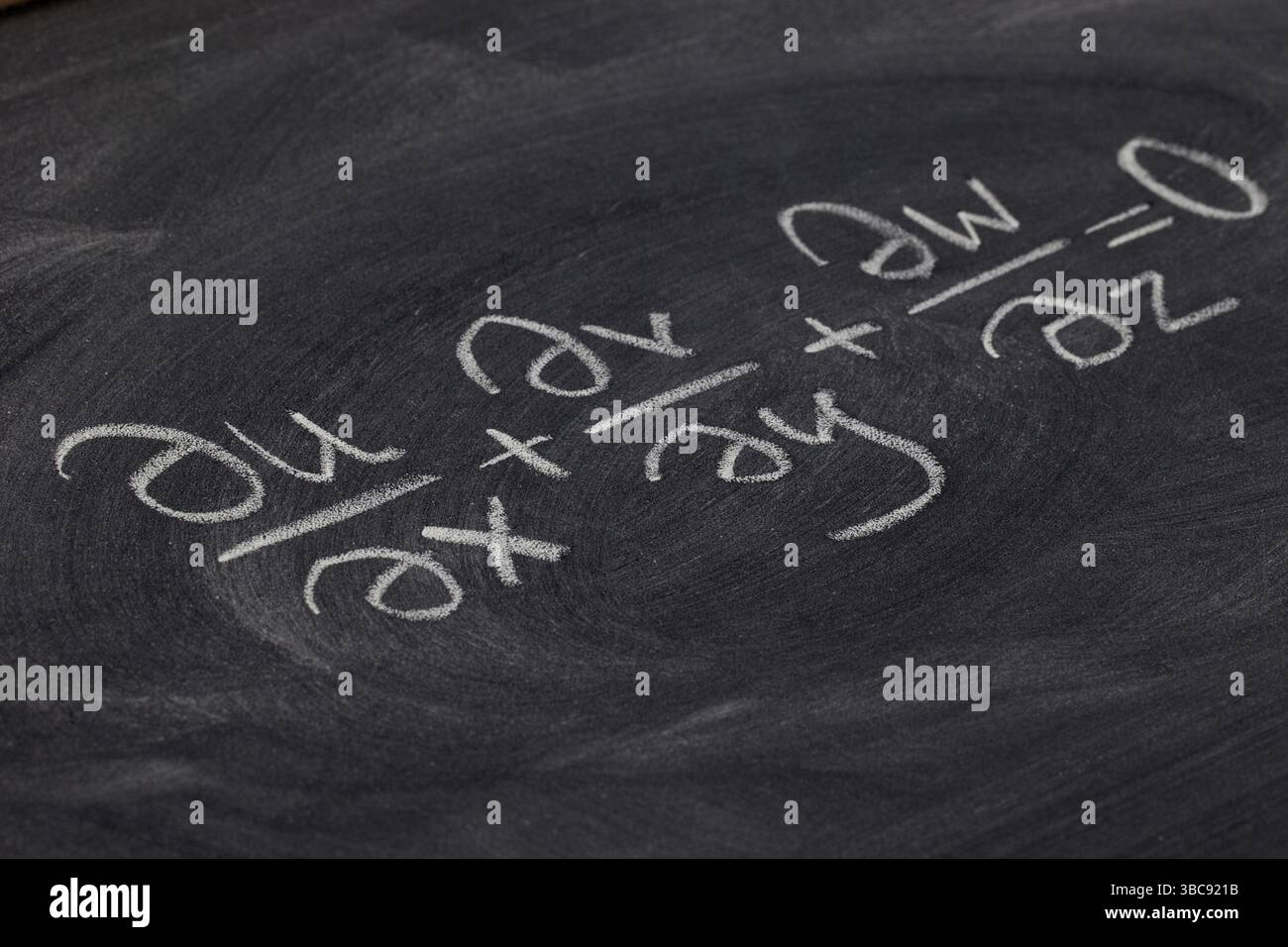 Équation de continuité (physique mathématique) - écriture à la craie blanche sur tableau noir Banque D'Images