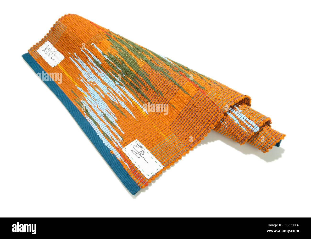 c. tapis orange mills photographié sur un fond blanc Banque D'Images