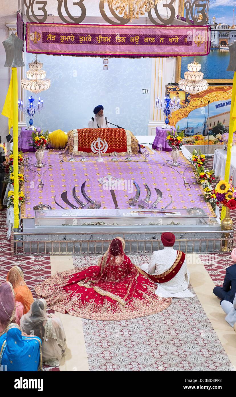 Une photo générique d'un mariage sikh de aboove et derrière. Dans un temple de New York. Banque D'Images
