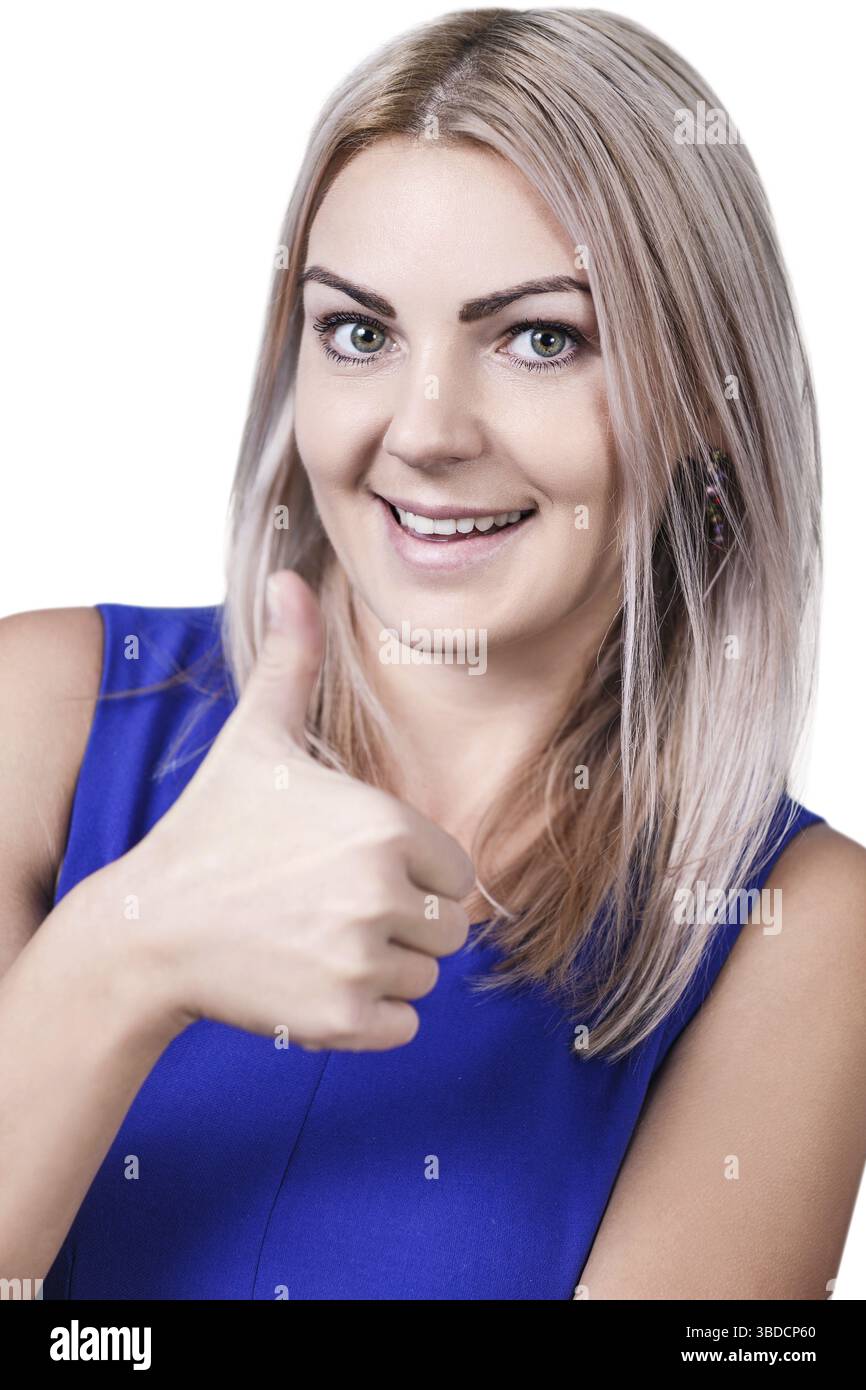 Femme souriante donnant des pouces vers le haut signe sur fond blanc Banque D'Images