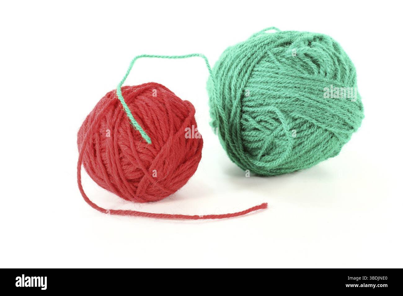 Boules colorées de laine en rouge et vert Banque D'Images