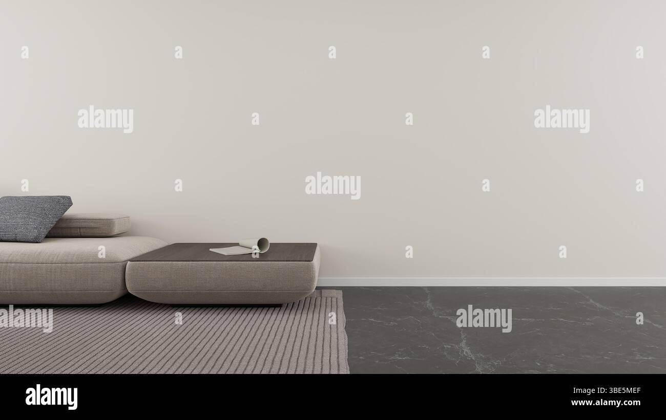 Un salon minimaliste dispose d'un canapé moderne avec des coussins et une table élégante sur un tapis texturé. La palette neutre et les lignes épurées créent un calme Banque D'Images