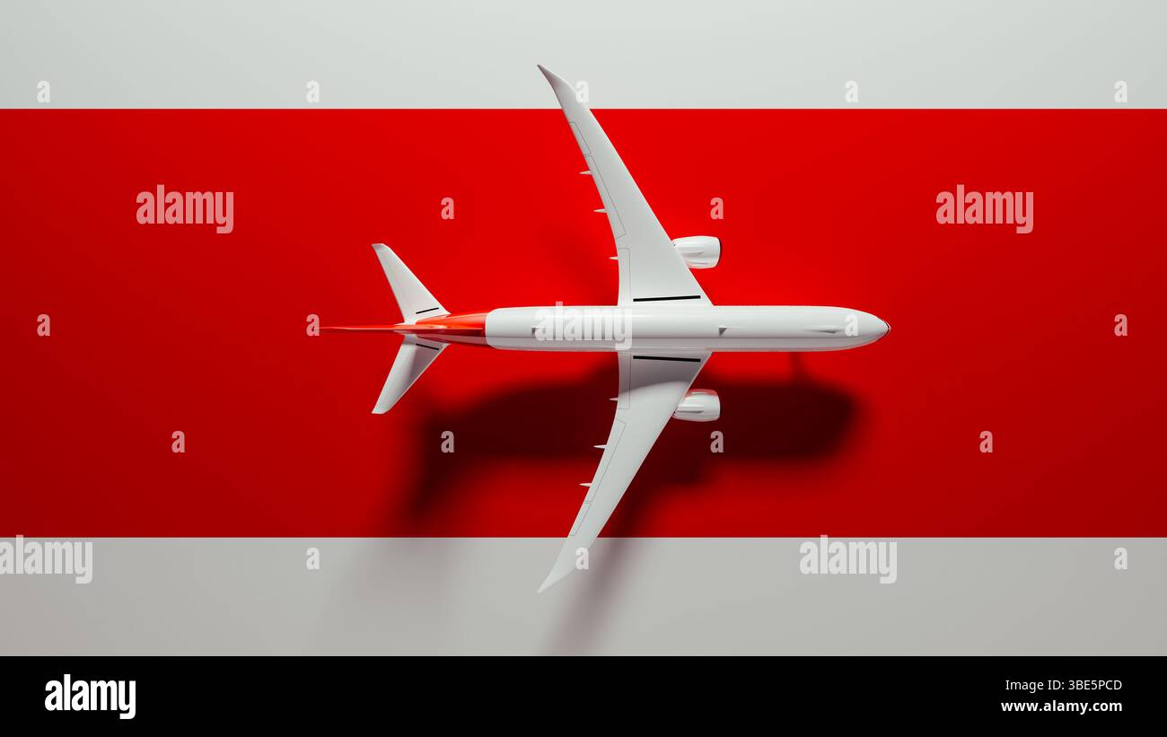 Un avion commercial saisissant survole une surface rouge audacieuse, symbolisant le voyage et l'aventure. Représentation parfaite de l'excitation de l'aviation. Banque D'Images