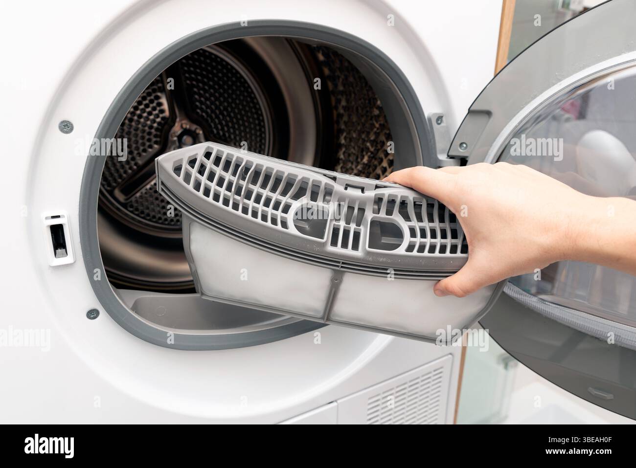 Filtre de nettoyage pour sèche-linge. Tâches ménagères Banque D'Images