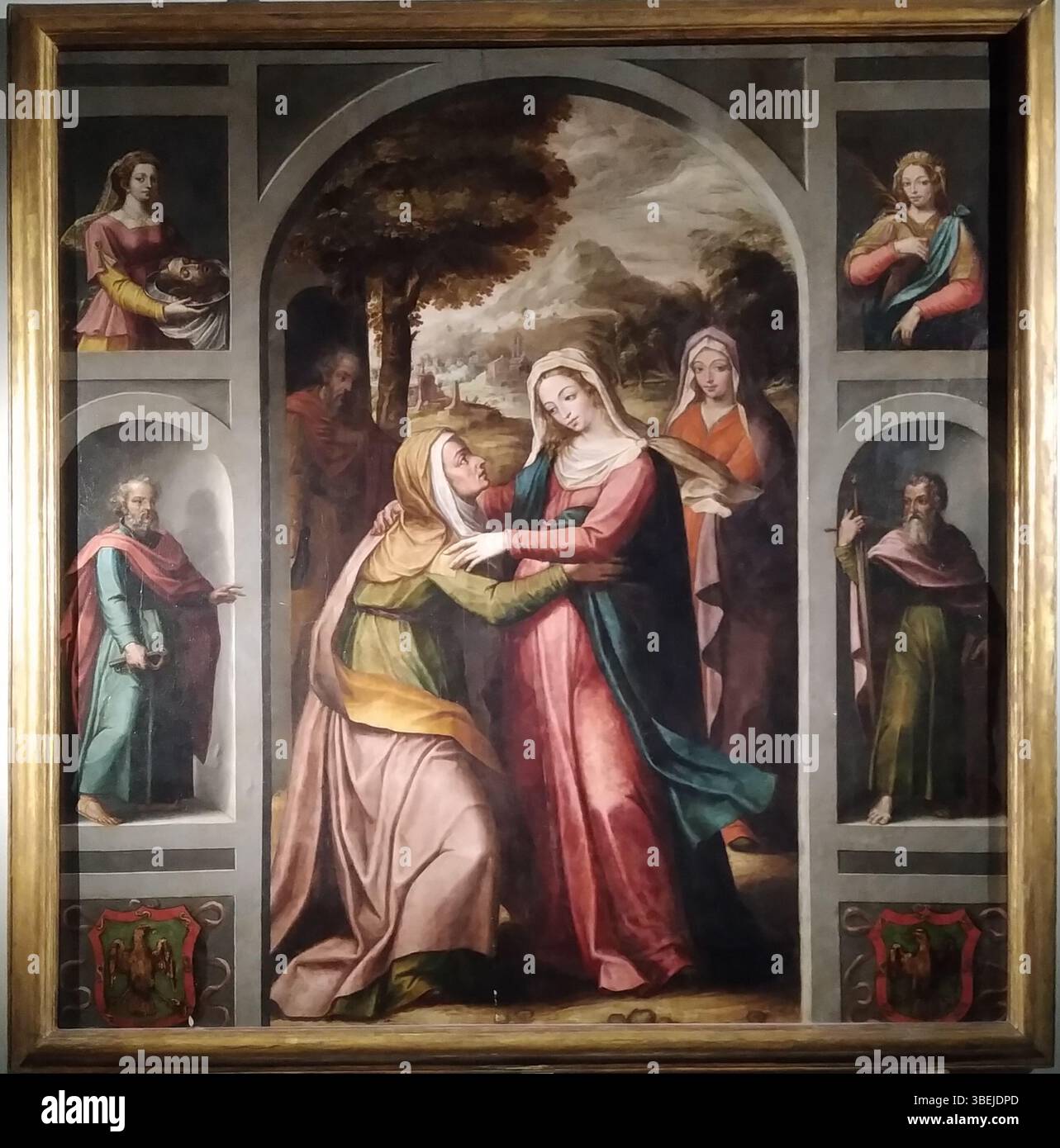 Le tableau « Visitation in Église Saint-Hippolyte (Paris) » est une œuvre d'art du XVIIe siècle qui représente la scène biblique de la Visitation, où la Vierge Marie rend visite à sa cousine Elizabeth. Créé en 1650, le tableau s’inscrit dans l’art baroque français et met en valeur la profondeur émotionnelle typique de l’époque. Banque D'Images