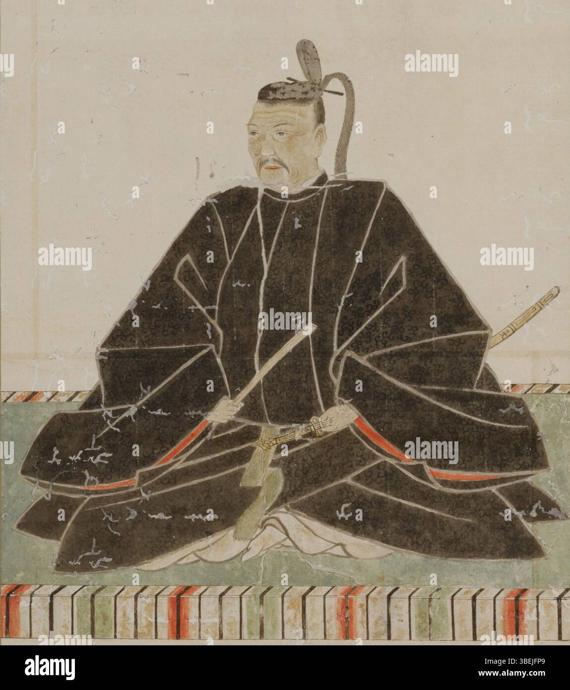 Ce portrait datant d'environ 1600 représente Asano Nagamasa, le 14e daimyo du clan Asano pendant la période Azuchi-Momoyama au Japon. Connu pour son leadership militaire et en tant que proche conseiller de Toyotomi Hideyoshi, Nagamasa joue un rôle important dans l'histoire politique et militaire du Japon. Banque D'Images