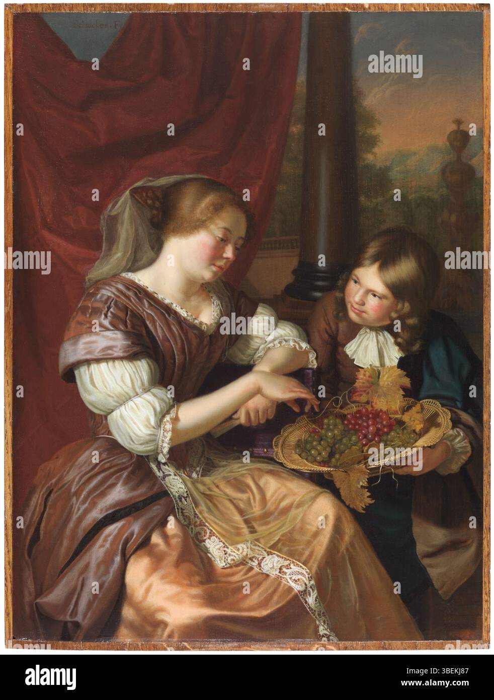 Ce tableau, attribué à Maria Schalcken, montre un garçon offrant des raisins à une femme, reflétant le style de scène intime et de genre du néerlandais du XVIIe siècle L'œuvre, datant d'environ 1675, illustre l'interaction domestique tranquille, typique de la peinture de genre de l'époque. Banque D'Images
