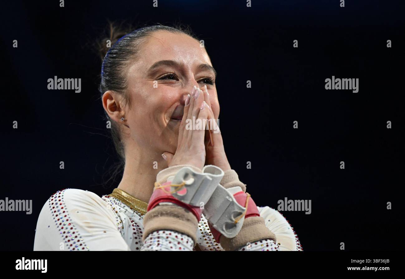 Nina Derwael, of Belgium reacts after winning the gold medal on the uneven bars women's competition during the European Gymnastics Championships in Leipzig, Germany, Friday, May 30, 2025. (Marijan Murat/dpa via AP) Banque D'Images