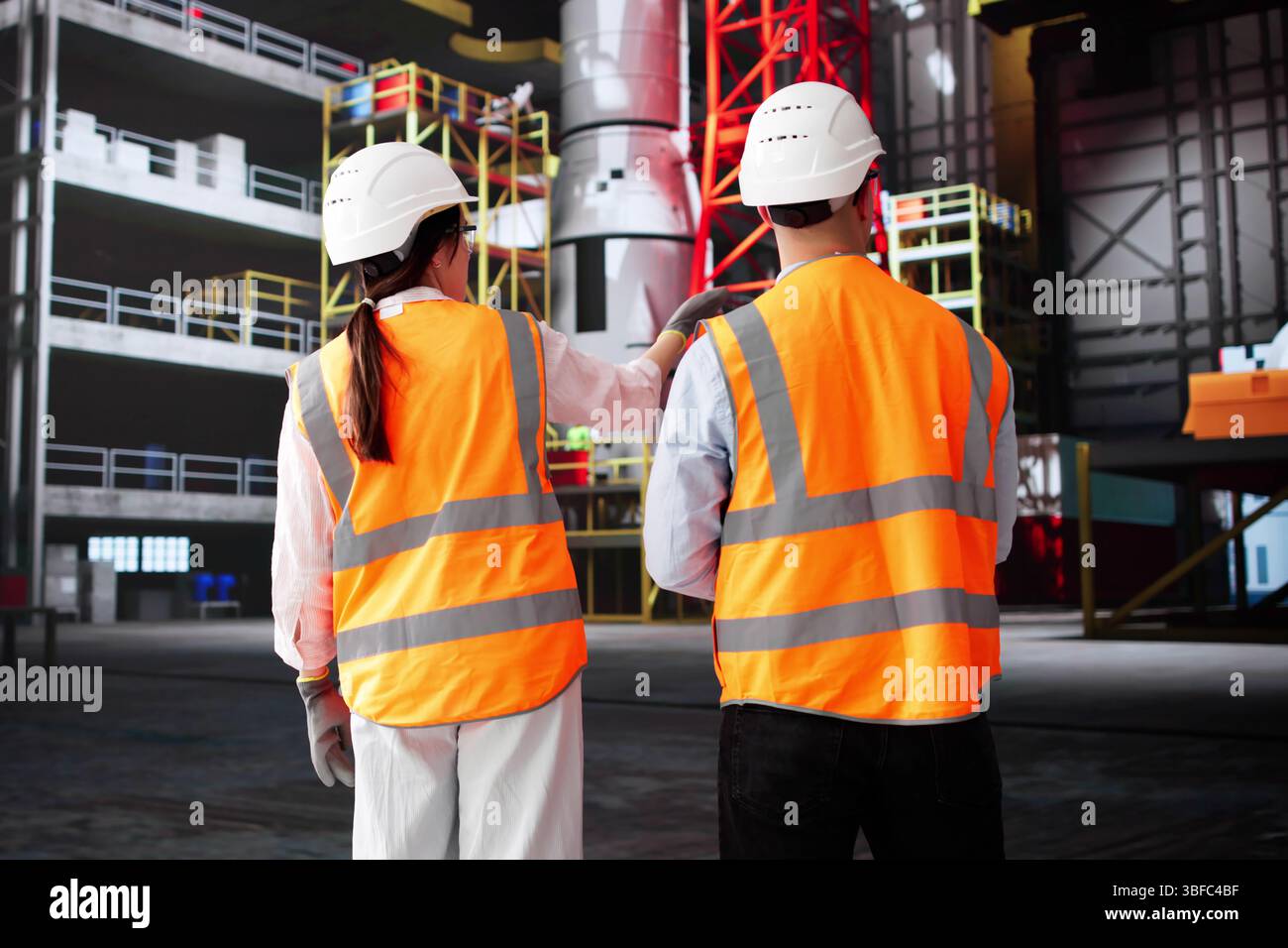 L'équipe d'ingénieurs conçoit des fusées à l'usine industrielle Banque D'Images L'équipe d'ingénieurs conçoit des fusées à l'usine industrielle Banque D'Images