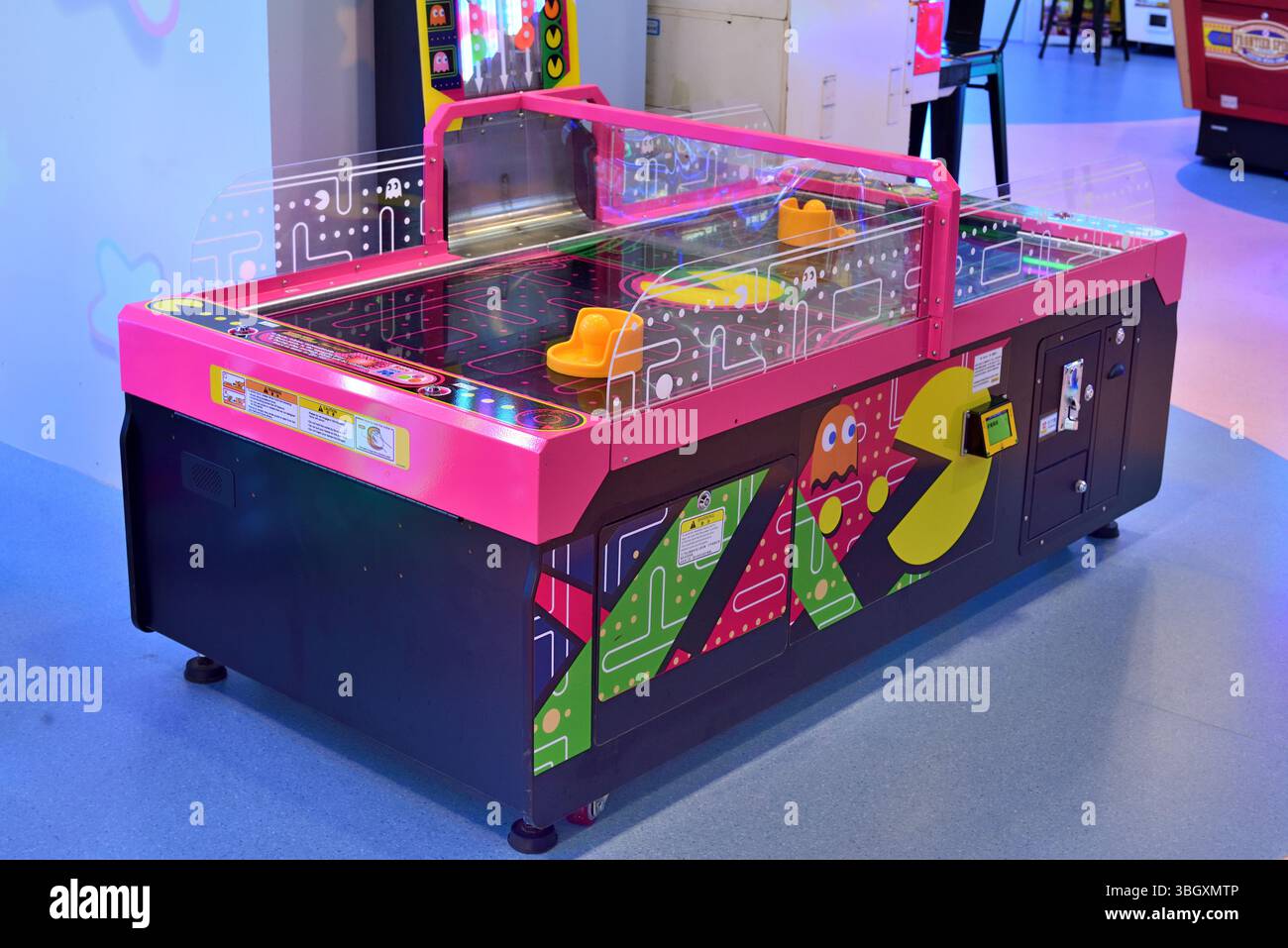 Station de hockey pneumatique PAC MAN Banque D'Images