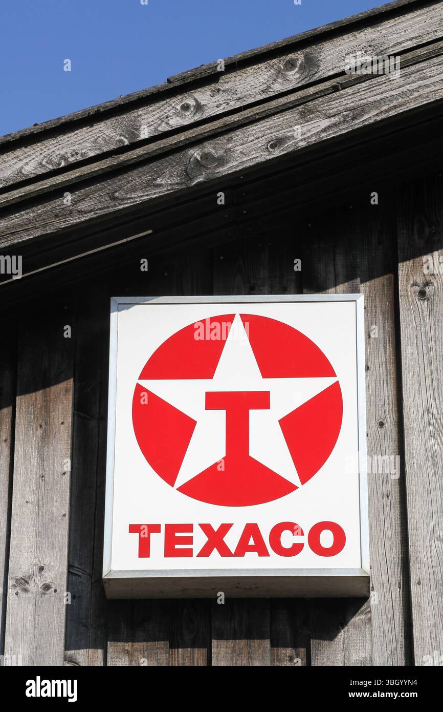 Logo Texaco sur un mur. Texaco est une filiale pétrolière américaine de Chevron Corporation Banque D'Images