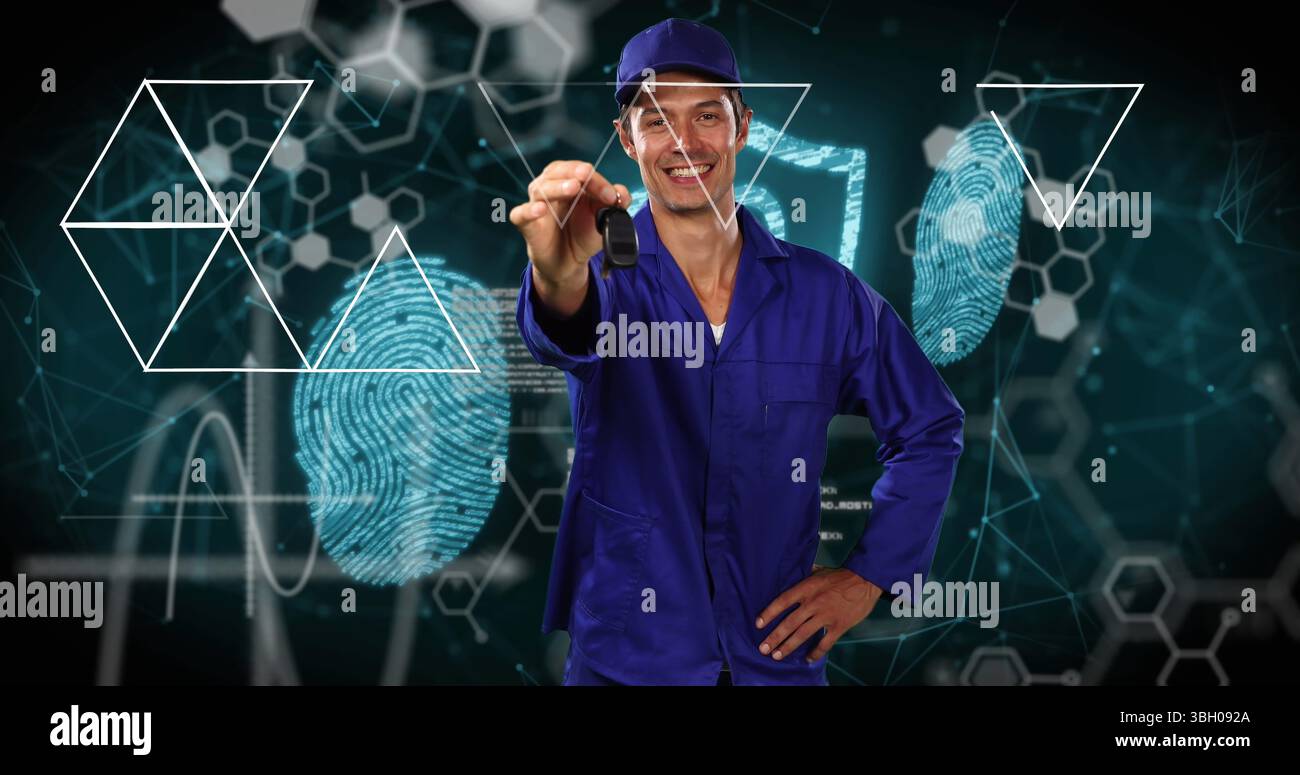 Image de formes et de traitement de données sur un homme caucasien tenant des clés Banque D'Images