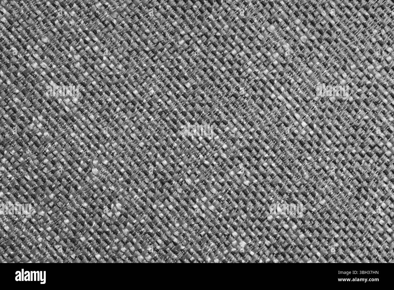 Rembourrage gris tissu jacquard couleur grise texture grossière diagonale tissage gros plan, macro. Fond textile, matériau textile de meubles, papier peint, dos Banque D'Images