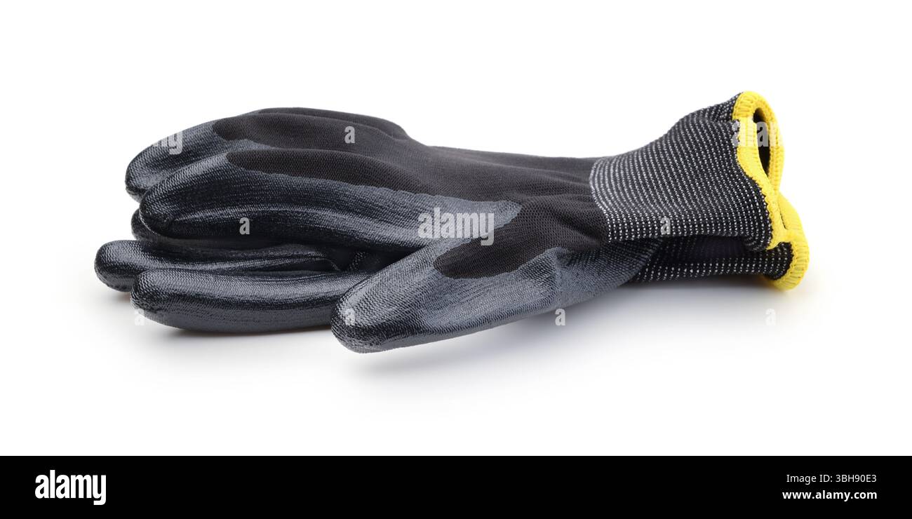 Une paire de gants de travail neufs isolés sur blanc. Banque D'Images