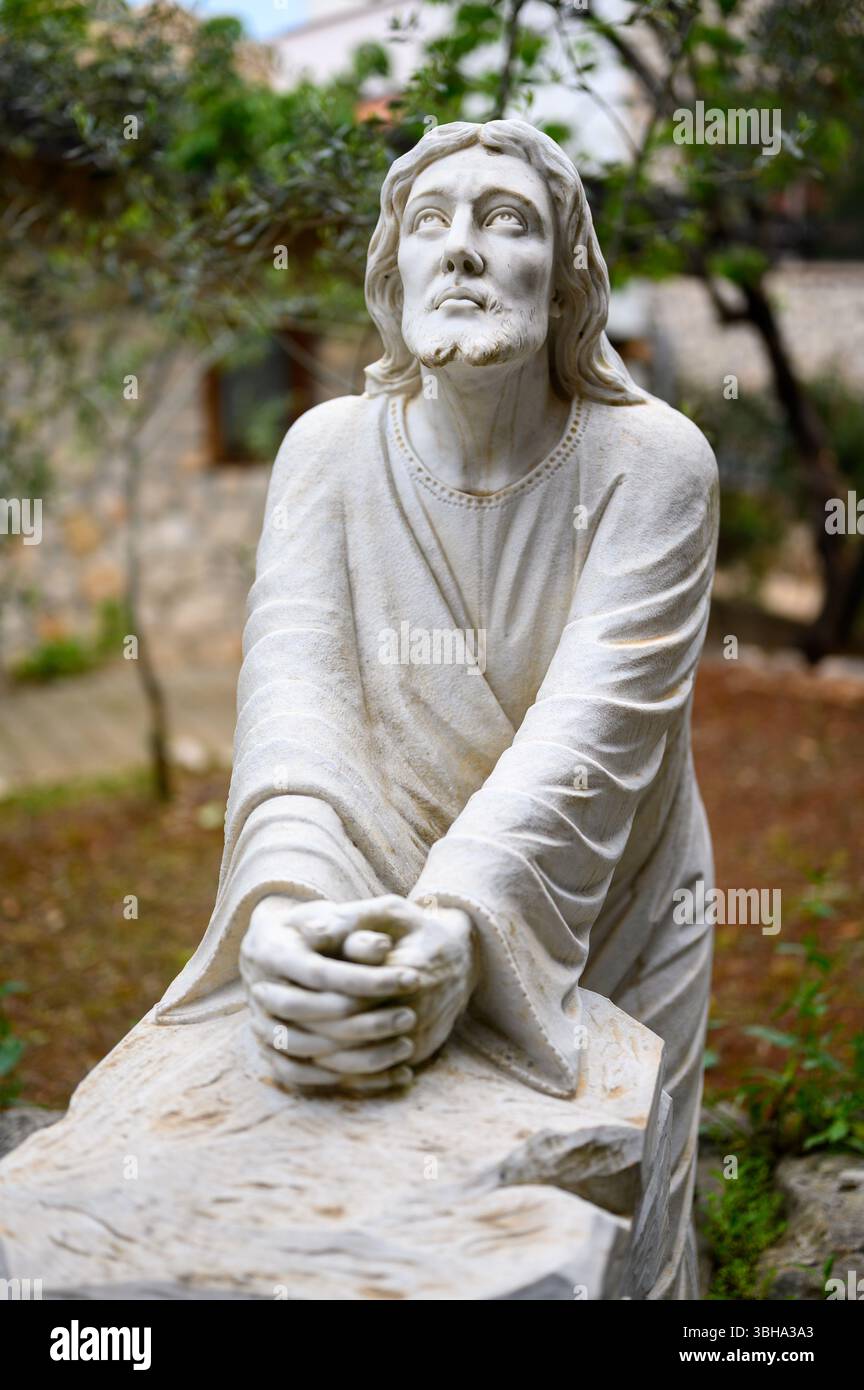L'agonie de Jésus dans le jardin de Gethsémani. Une statue près d'une chapelle communautaire à Medjugorje. Banque D'Images