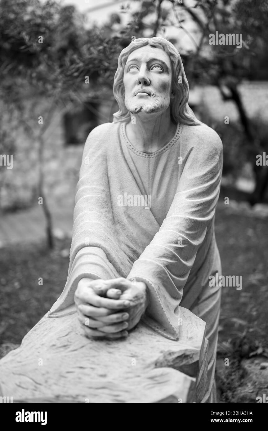 L'agonie de Jésus dans le jardin de Gethsémani. Une statue près d'une chapelle communautaire à Medjugorje. Banque D'Images