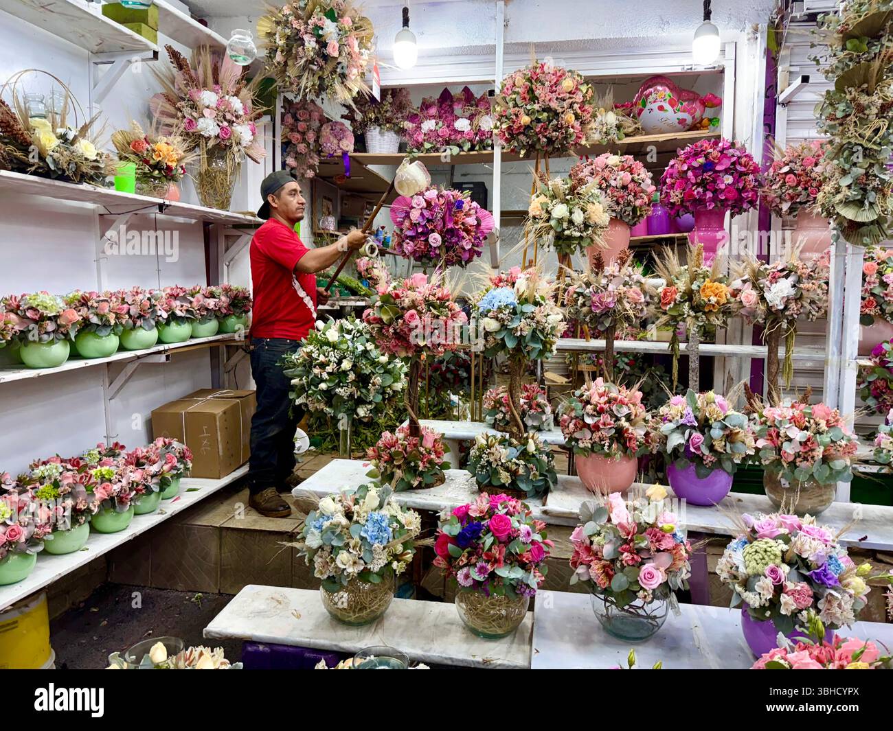 Fleuriste, Mercado Jamaica, l’un des marchés publics traditionnels de Mexico. CDMX, Mexique Banque D'Images