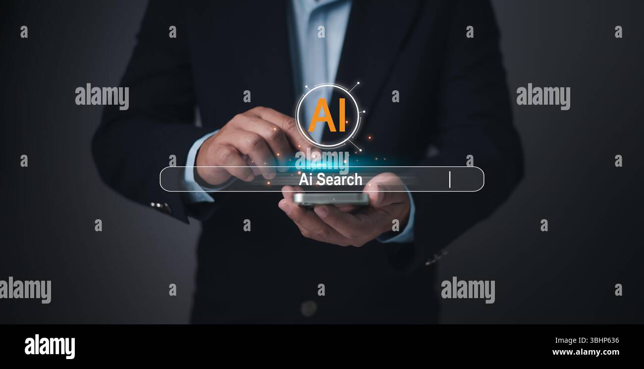 Un homme d'affaires interagit avec une barre de recherche futuriste IA sur un smartphone, indiquant l'intégration de technologies avancées, les capacités de recherche intelligente, et th Banque D'Images