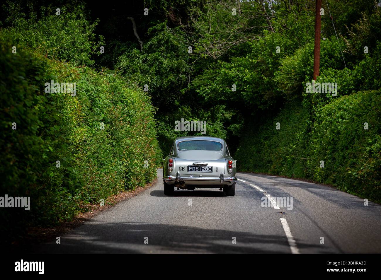 L'Aston Martin DB5 est une grande randonneuse britannique (GT) produite par Aston Martin et conçue par le carrossier italien Carrozzeria Touring Superleggera. Banque D'Images