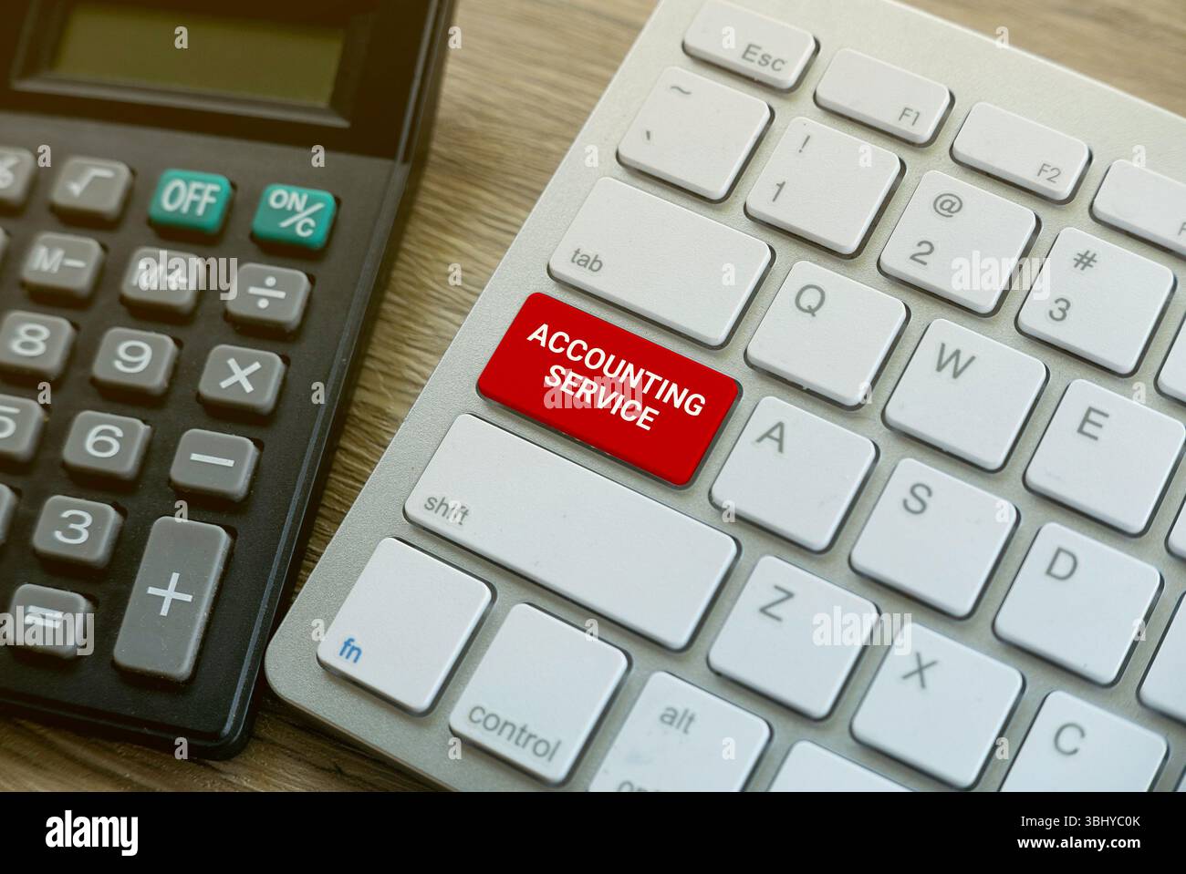 Calculatrice et clavier avec clé de service de comptabilité Banque D'Images