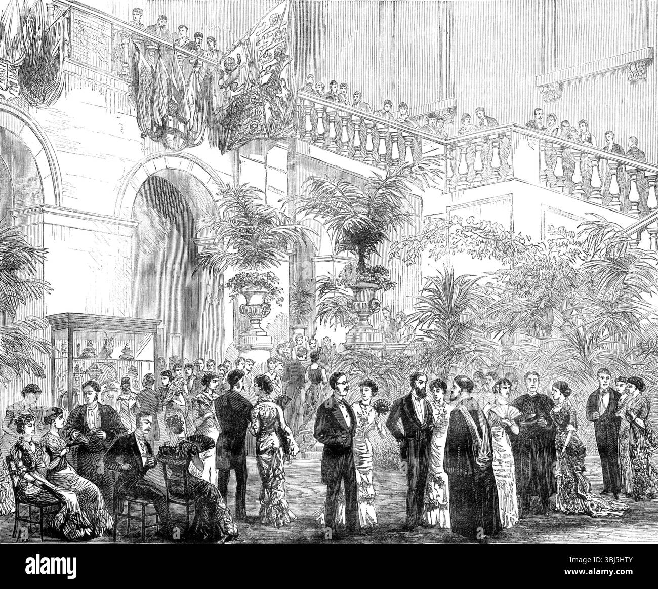 Jubilee Festival au King's College, Londres, 1881. Le cinquantième anniversaire, ou jubilé, de la création du King's College, Londres, a été célébré samedi dernier. Dans l'après-midi, le prince de Galles, accompagné de la princesse de Galles, a visité King's College dans le but de distribuer les prix aux étudiants et aux érudits réussis dans les différents départements... le parti royal est entré dans la grande salle, qui a été joliment décorée, et a été reçu avec des applaudissements enthousiastes par la vaste multitude Assemblée pour assister aux délibérations... dans la soirée une conversazione a eu lieu au t Banque D'Images