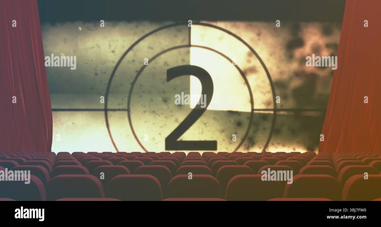 Montrant grand écran de projection à rebours numéro deux dans l'auditorium de cinéma, sièges en velours rouge Banque D'Images