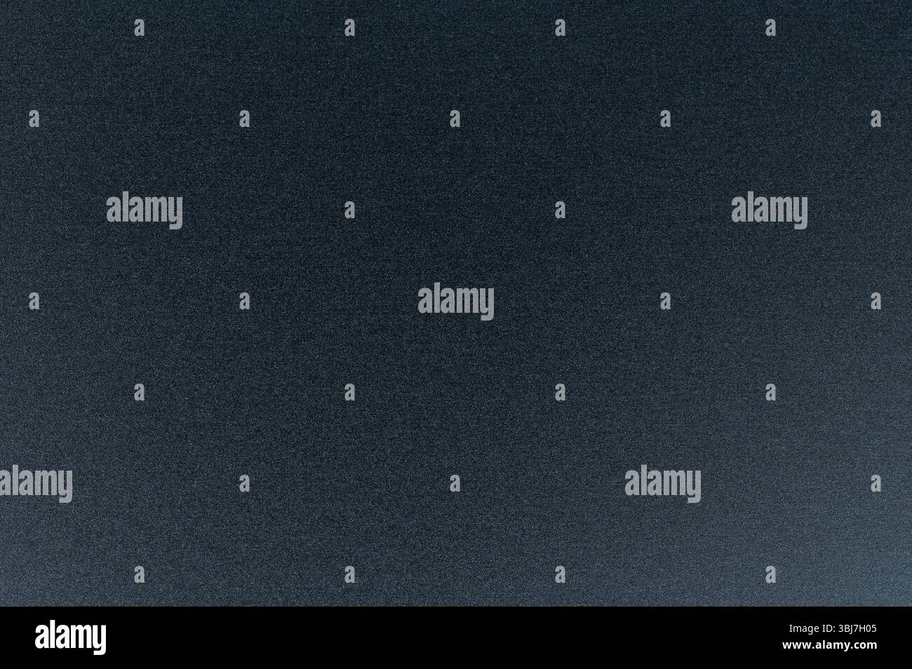 Surface présente une texture noire profonde, offrant une profondeur visuelle riche et une toile pour des interprétations et des designs créatifs. Banque D'Images